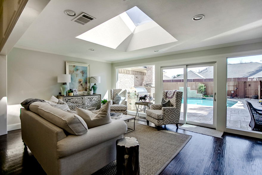 This is an example of a large contemporary conservatory in Dallas with a skylight.