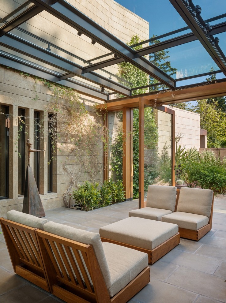 Design ideas for a medium sized contemporary conservatory in Seattle with concrete flooring and a glass ceiling.