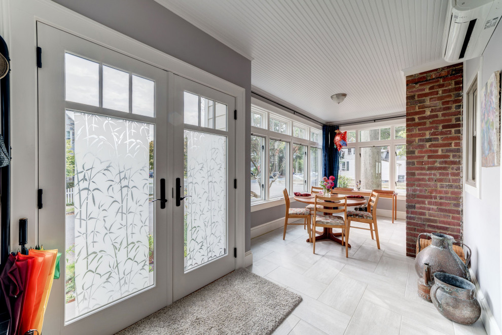 Mid-sized transitional porcelain tile and gray floor sunroom photo in DC Metro with a standard fireplace, a brick fireplace and a standard ceiling