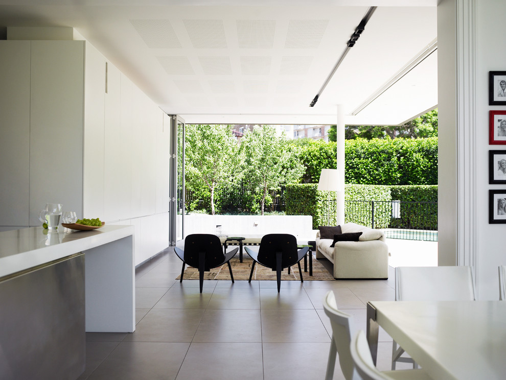 This is an example of a large contemporary conservatory in Sydney with a standard ceiling.