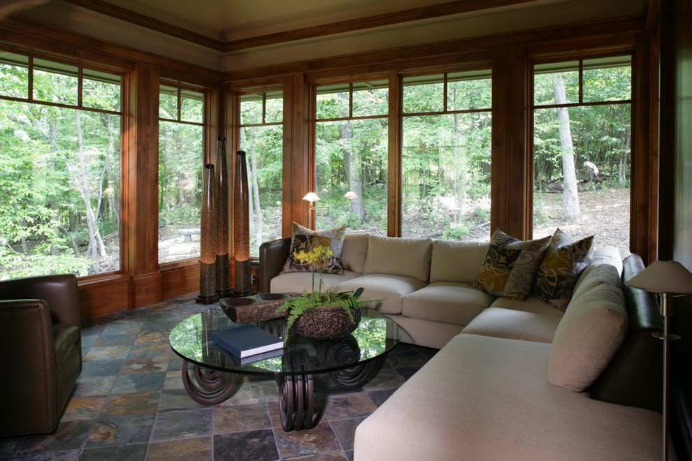 Photo of a large world-inspired conservatory in Minneapolis with slate flooring.