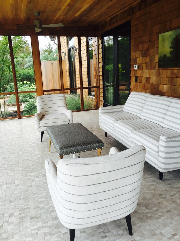 Example of a large minimalist ceramic tile sunroom design in New York with a standard ceiling