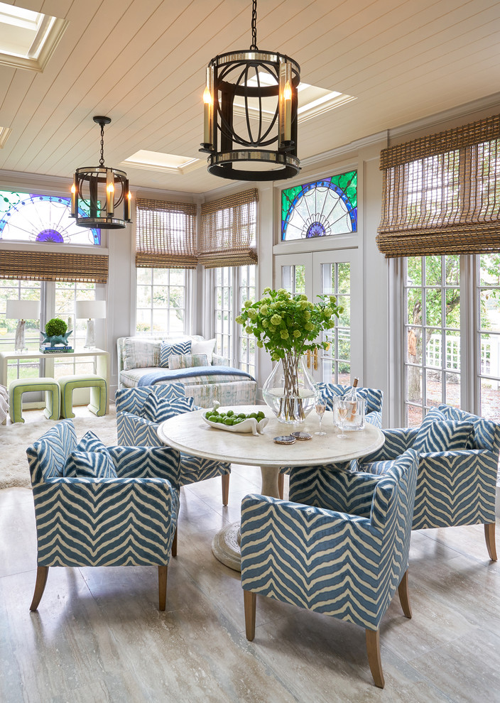 Example of a transitional beige floor sunroom design in New York with a skylight