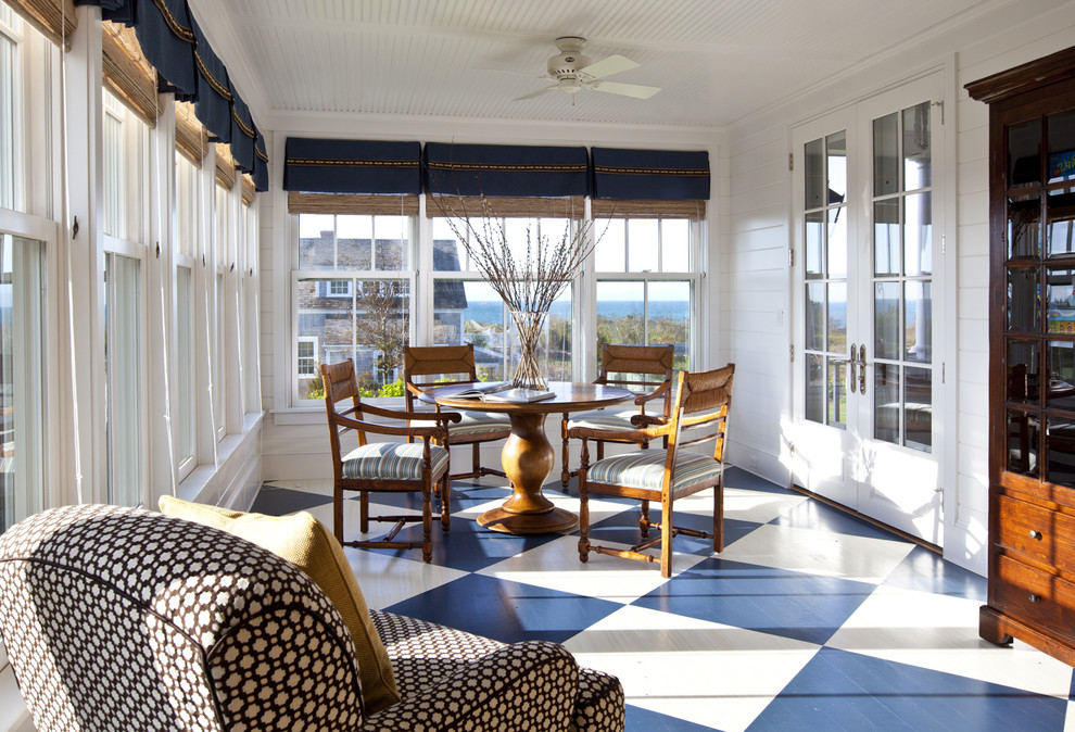 Example of a large classic painted wood floor and multicolored floor sunroom design in Boston with a standard ceiling