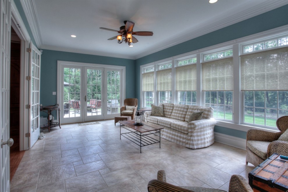 Inspiration for a large timeless ceramic tile and gray floor sunroom remodel in New York with no fireplace and a standard ceiling