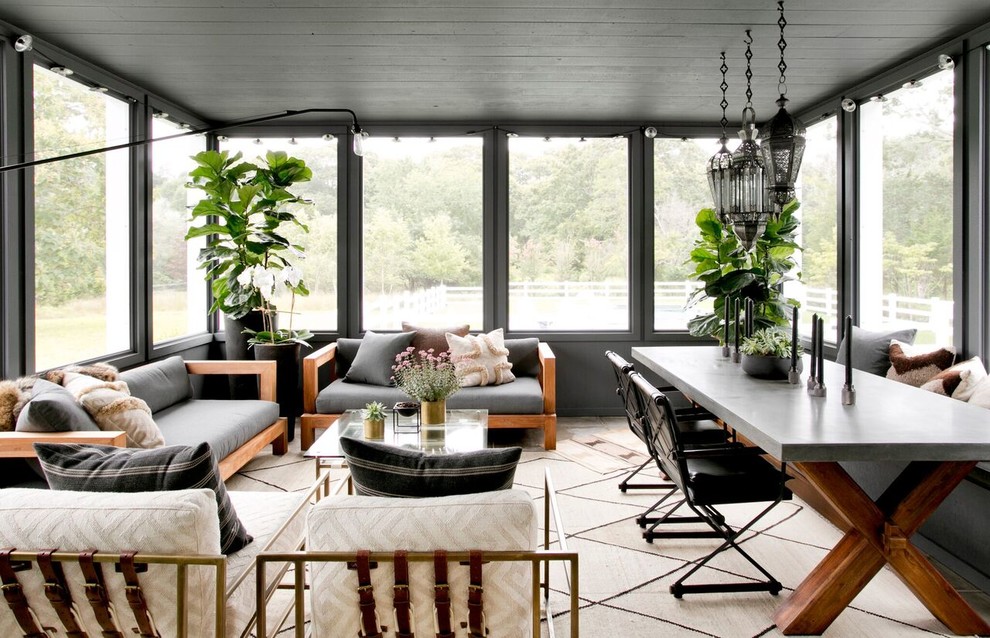 Esempio di una grande veranda country con pavimento in cemento, soffitto classico e pavimento grigio