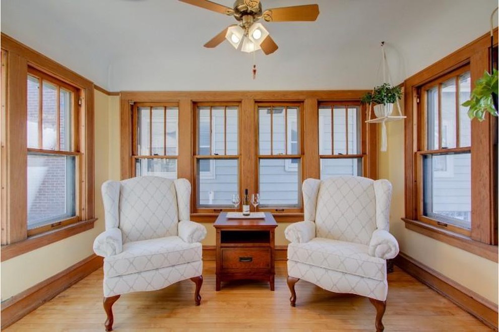 Example of an arts and crafts sunroom design in Other
