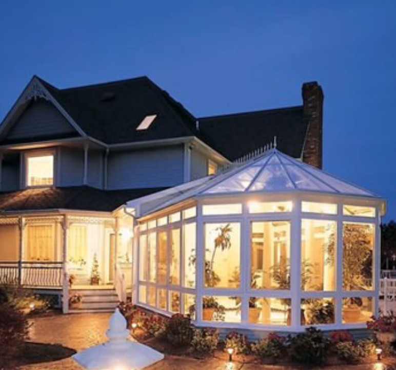 Medium sized victorian conservatory in Nashville with a glass ceiling.