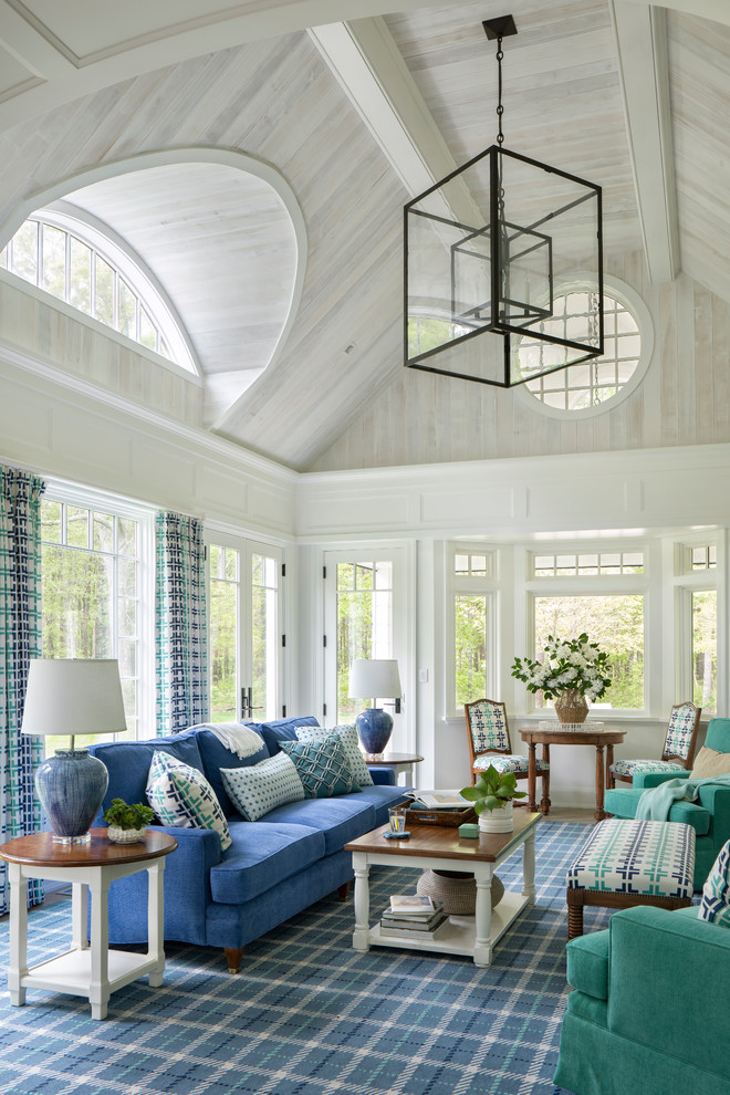 Beach style conservatory in Boston with no fireplace, a standard ceiling and feature lighting.