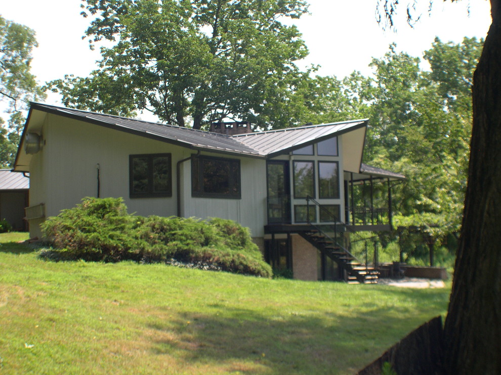 Pond House near Square, PA Midcentury Sunroom