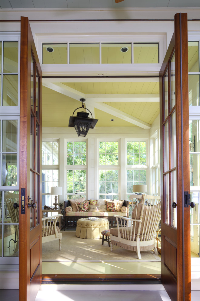 Photo of a nautical conservatory in Other with a standard ceiling and yellow floors.