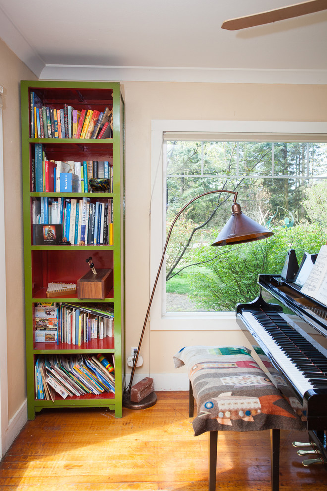 Photo of a small eclectic conservatory in Portland with dark hardwood flooring, no fireplace, a standard ceiling and brown floors.
