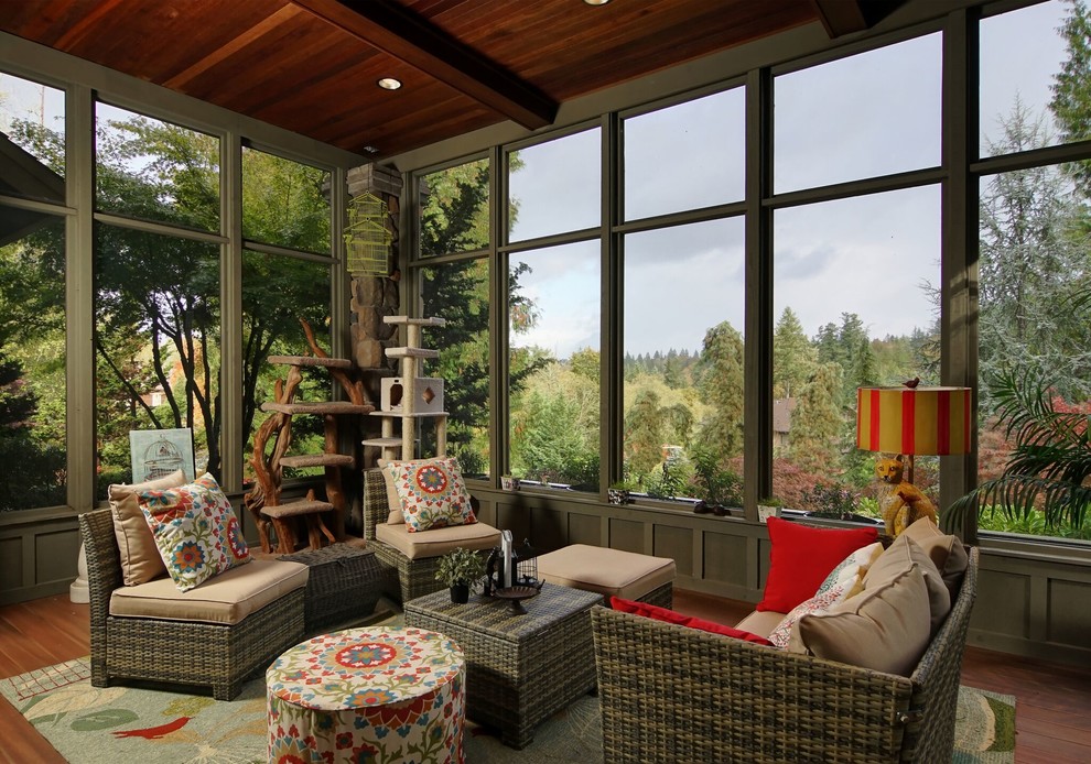 Inspiration for a rustic medium tone wood floor sunroom remodel in Portland with a standard ceiling