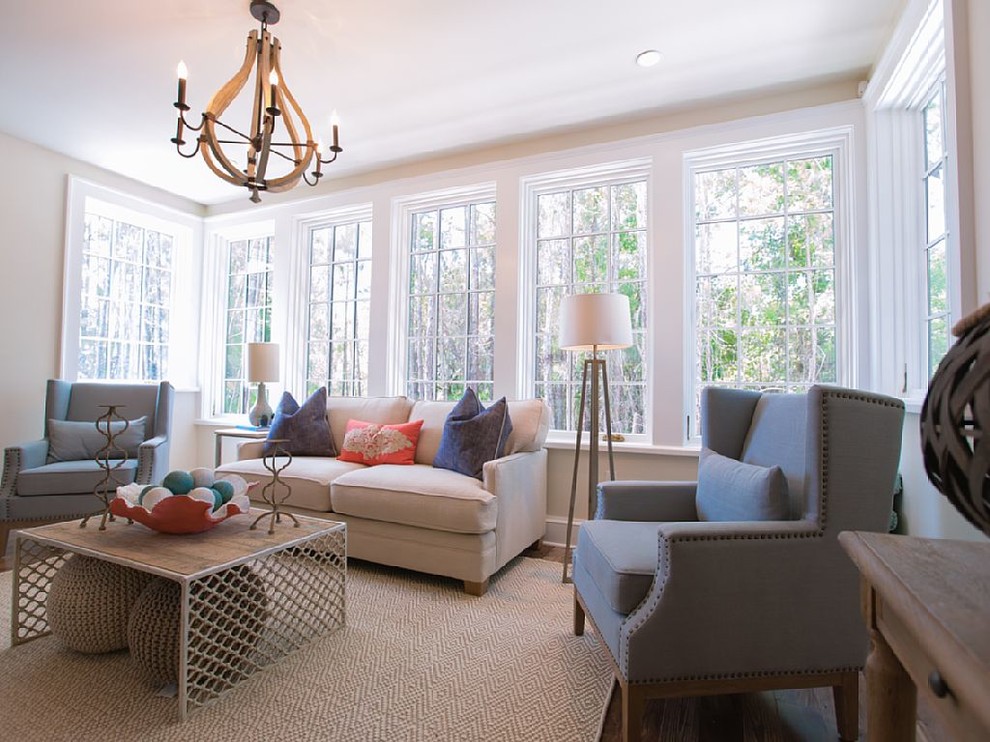 Inspiration for a huge coastal light wood floor sunroom remodel in Miami with a standard ceiling