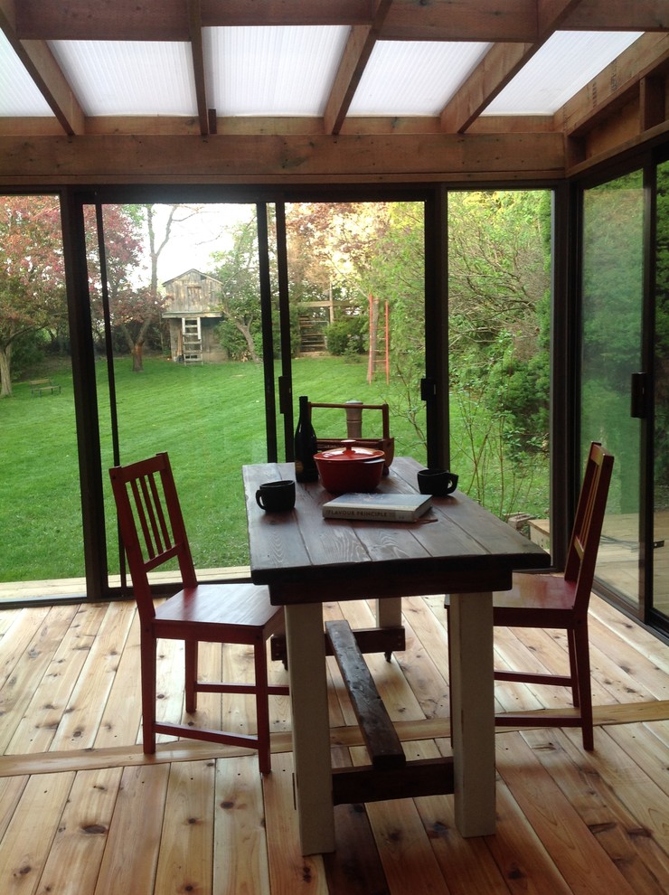 Small sunroom with cedar flooring Craftsman Sunroom Toronto by