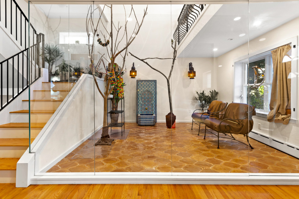Inspiration for a mid-sized eclectic terra-cotta tile and brown floor sunroom remodel in Boston with no fireplace and a standard ceiling