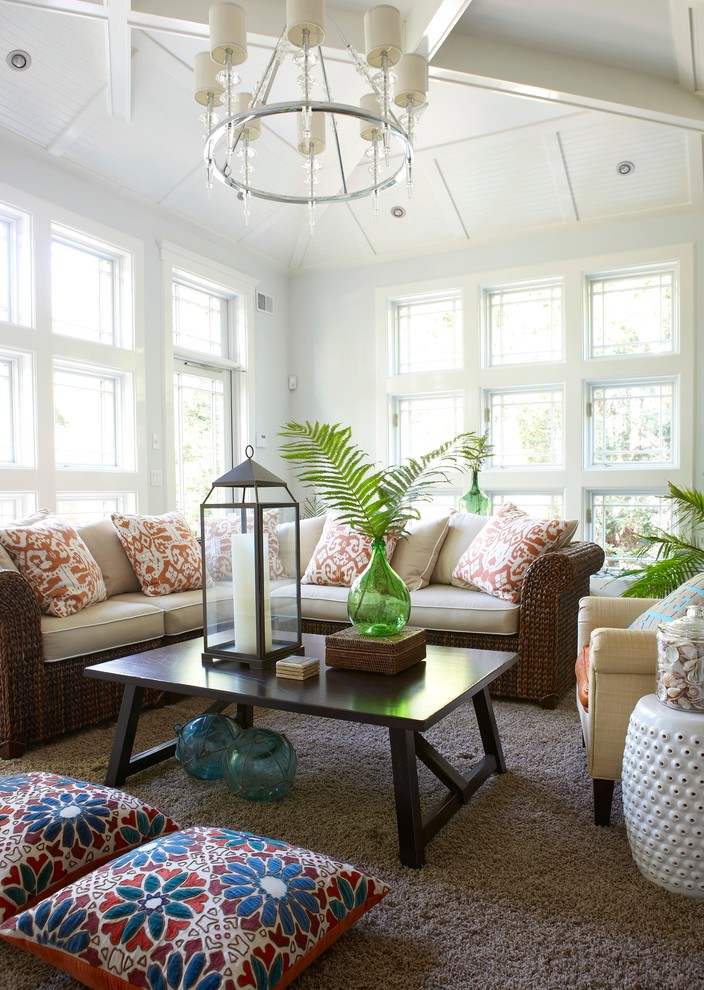 This is an example of a beach style conservatory in New York with carpet and a standard ceiling.