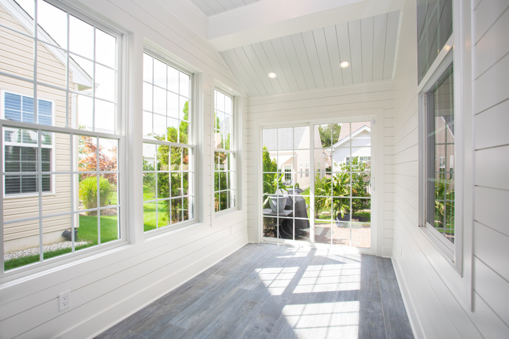 Esempio di una veranda minimal di medie dimensioni con pavimento con piastrelle in ceramica, nessun camino, soffitto classico e pavimento blu