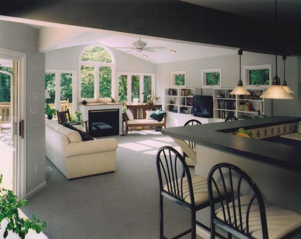 Large modern conservatory in Charlotte with ceramic flooring.