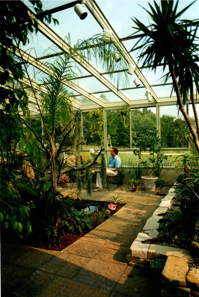 Inspiration for a mid-sized terra-cotta tile sunroom remodel in Other with a glass ceiling