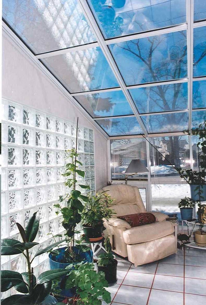 This is an example of a medium sized contemporary conservatory in Other with a glass ceiling and ceramic flooring.