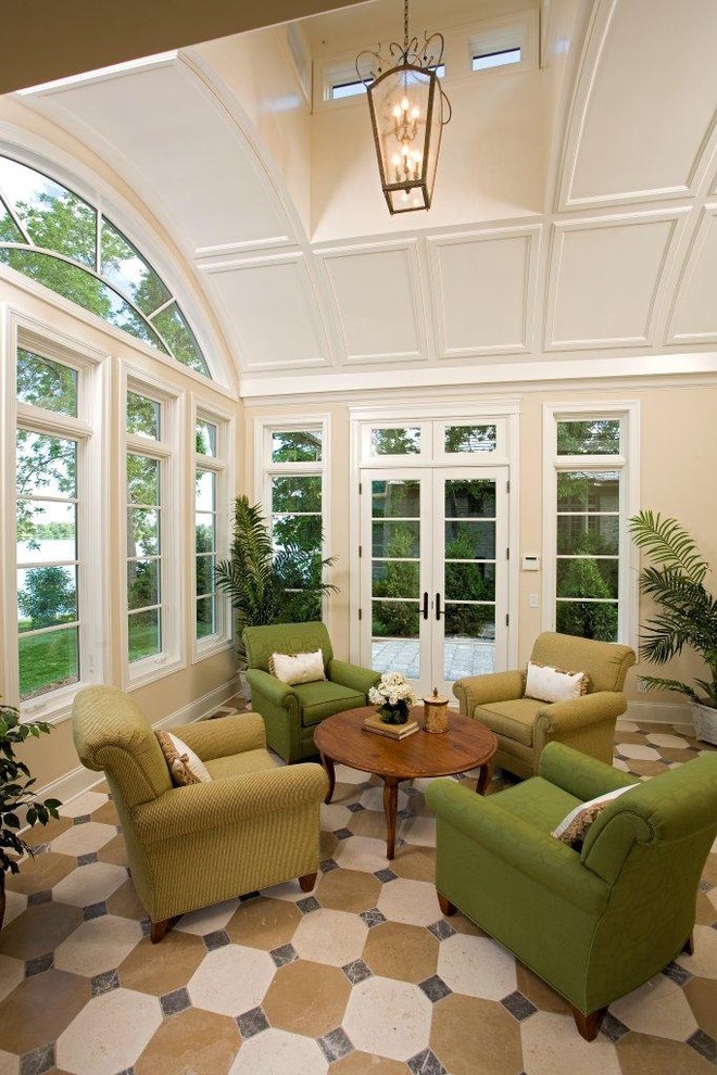 Photo of a traditional conservatory in Minneapolis with a skylight.