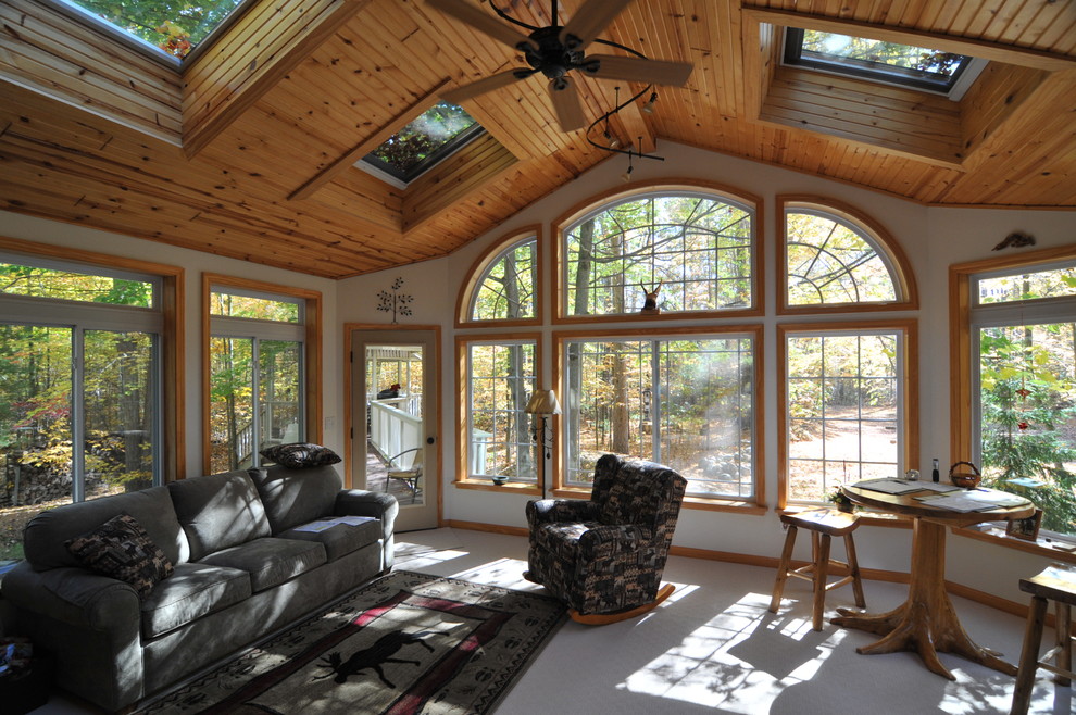 Design ideas for a large rustic conservatory in Other with a skylight.