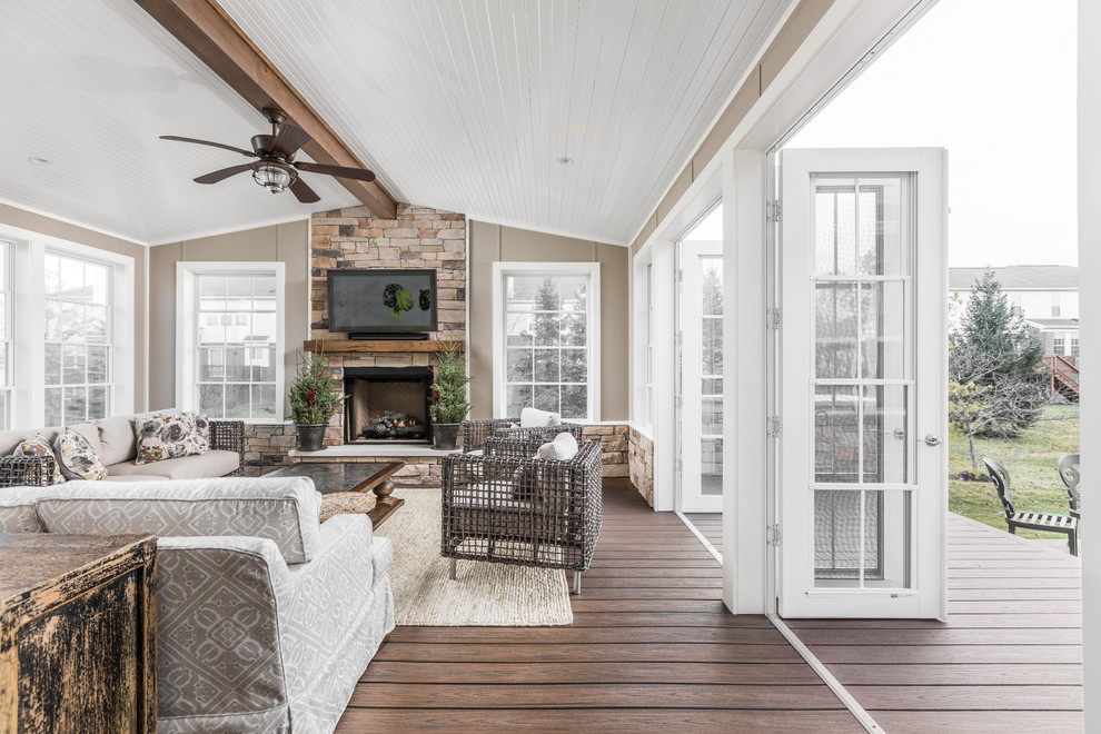 Mid-sized elegant sunroom photo in Indianapolis with a standard fireplace and a brick fireplace