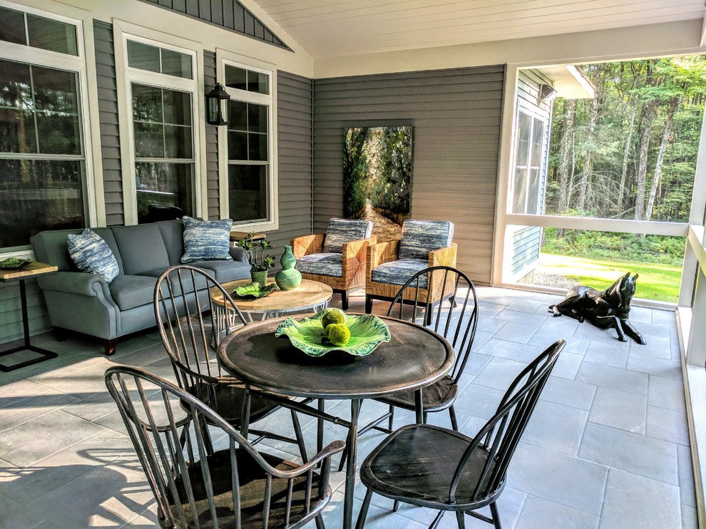 Esempio di una grande veranda tradizionale con pavimento con piastrelle in ceramica, soffitto classico e pavimento blu