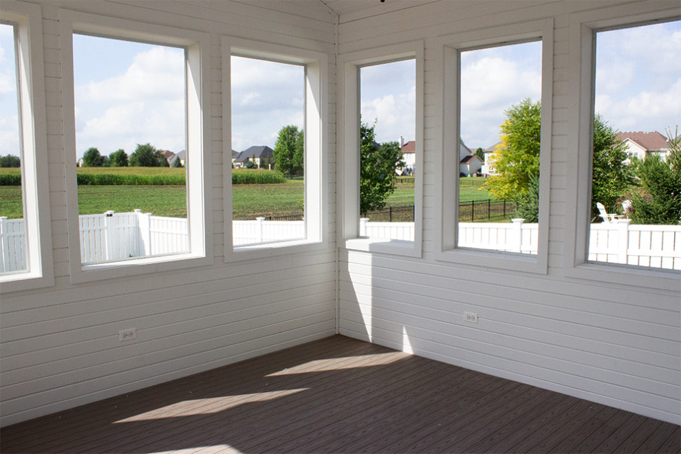Foto di una veranda stile marinaro con nessun camino, soffitto classico e pavimento grigio