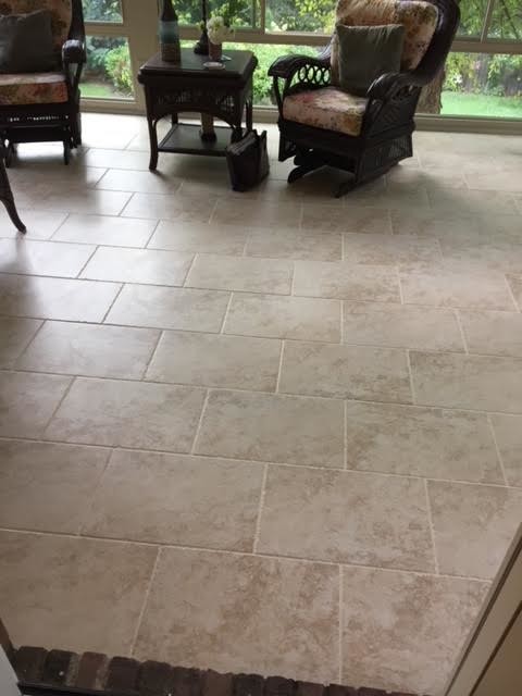 Example of a large classic porcelain tile and beige floor sunroom design in Other with no fireplace and a standard ceiling