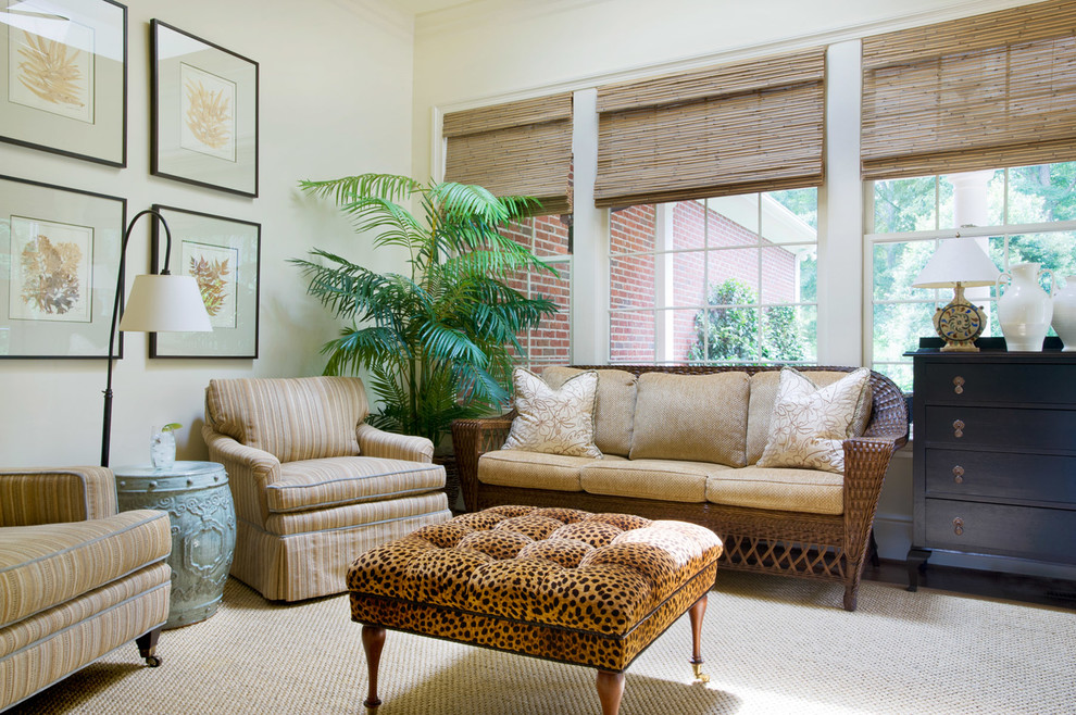 Traditional conservatory in Charlotte with medium hardwood flooring, a skylight and brown floors.
