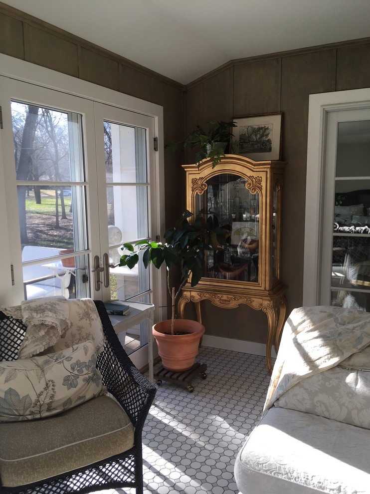 Small traditional conservatory in Omaha with no fireplace, a standard ceiling and white floors.