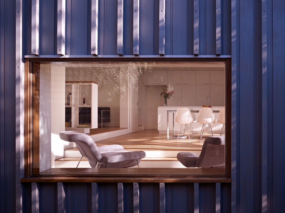 Idee per una veranda contemporanea di medie dimensioni con parquet chiaro