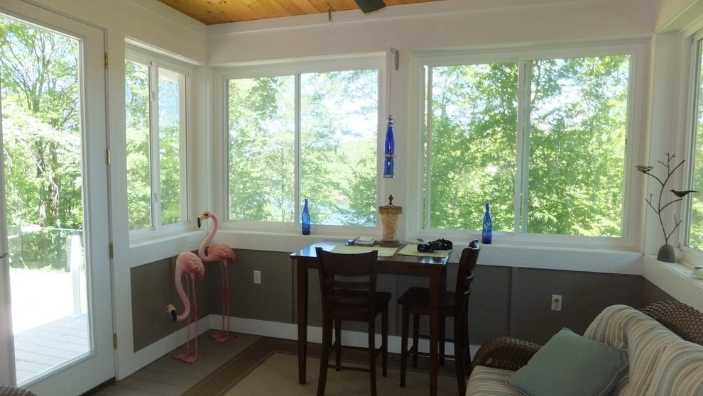 Example of a mid-sized classic sunroom design in Grand Rapids with no fireplace and a standard ceiling