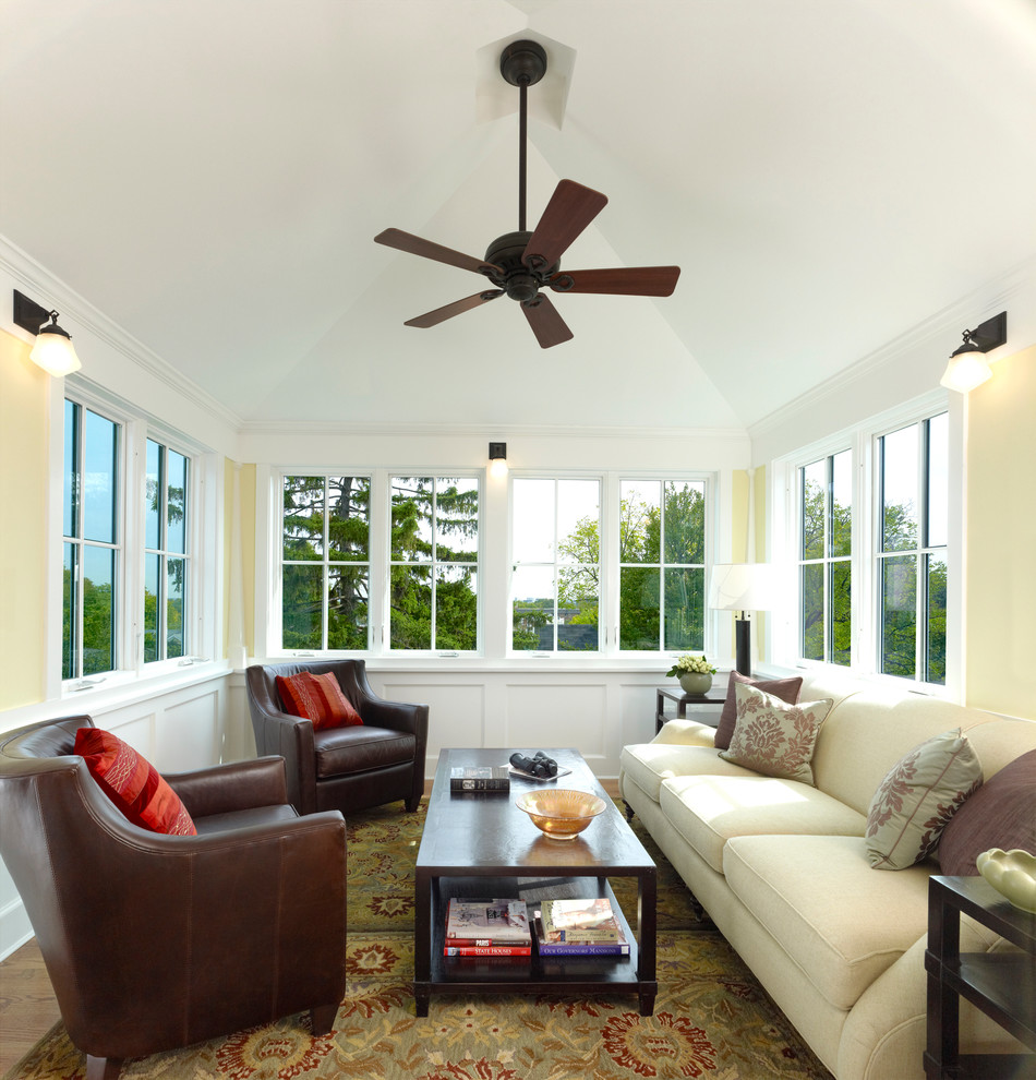 Arts and crafts medium tone wood floor sunroom photo in DC Metro with a standard ceiling