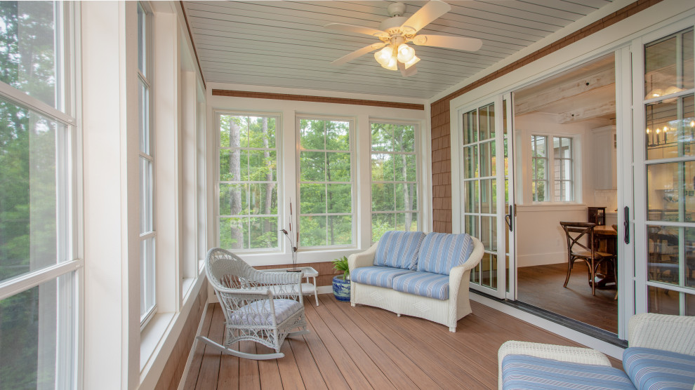 Sunroom - mid-sized traditional brown floor sunroom idea in Other