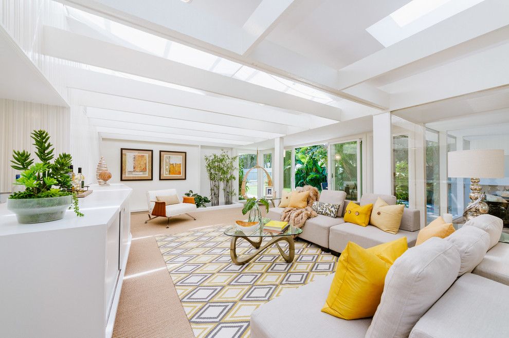 Example of a large 1960s carpeted and beige floor sunroom design in Los Angeles with a skylight