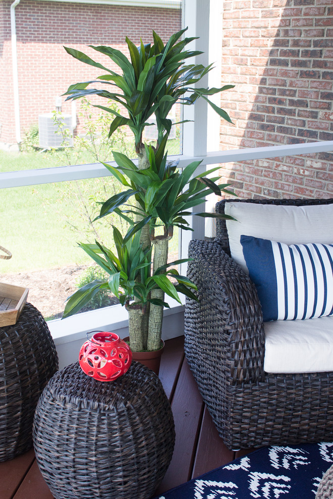 Wicker Woven Chair and Round Side Table with Bold Red Lantern Tropical Sunroom Miami by