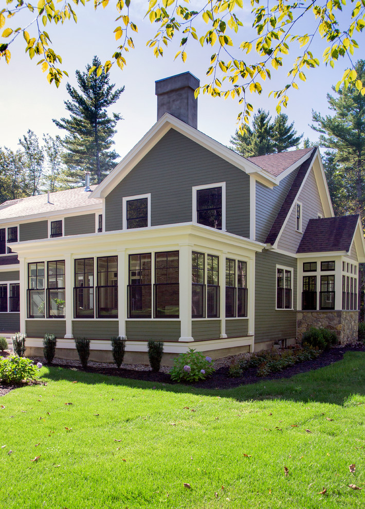 Ispirazione per una veranda tradizionale di medie dimensioni con parquet scuro e soffitto classico