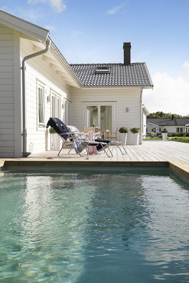 This is an example of a scandi swimming pool in Other.