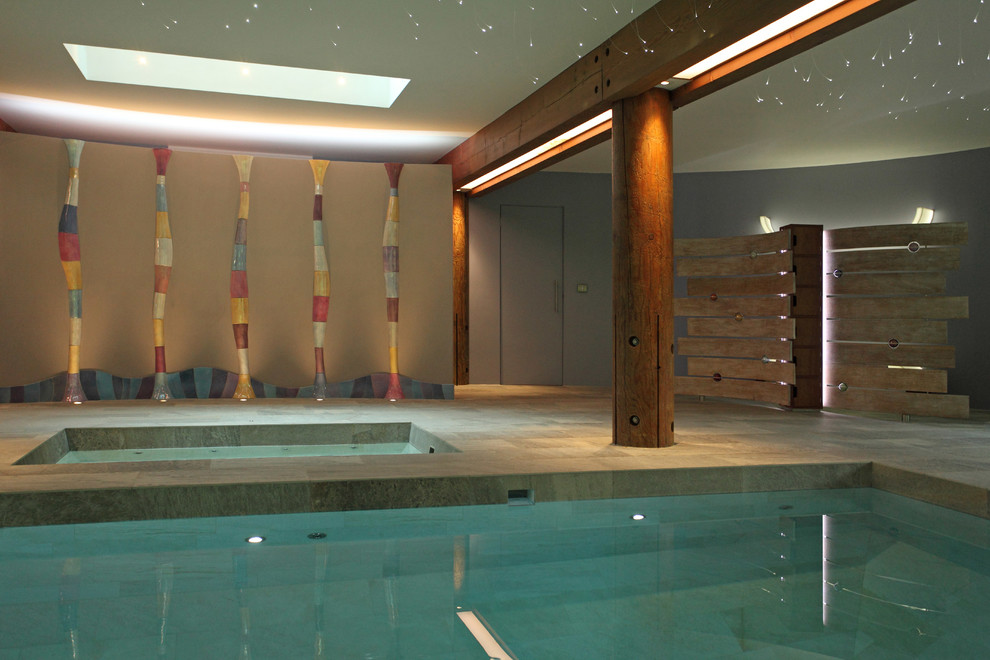 Contemporary swimming pool in Hampshire.