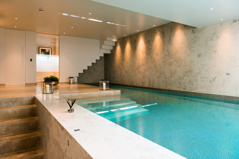 Inspiration for a contemporary indoor l-shaped swimming pool in London.