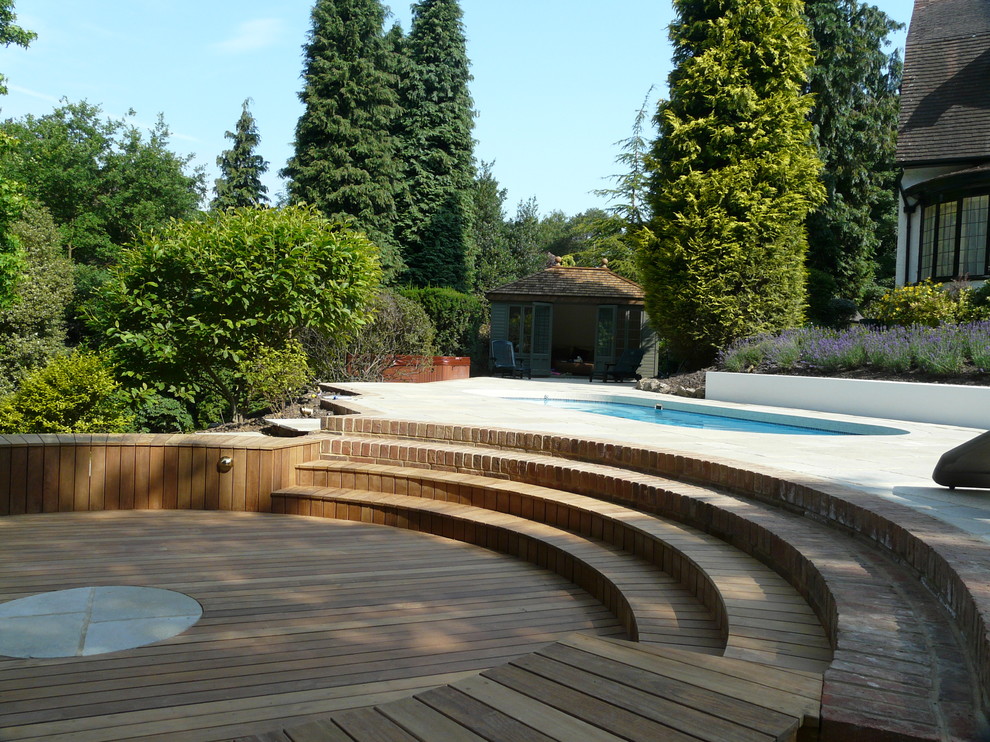 Design ideas for a contemporary swimming pool in Surrey.