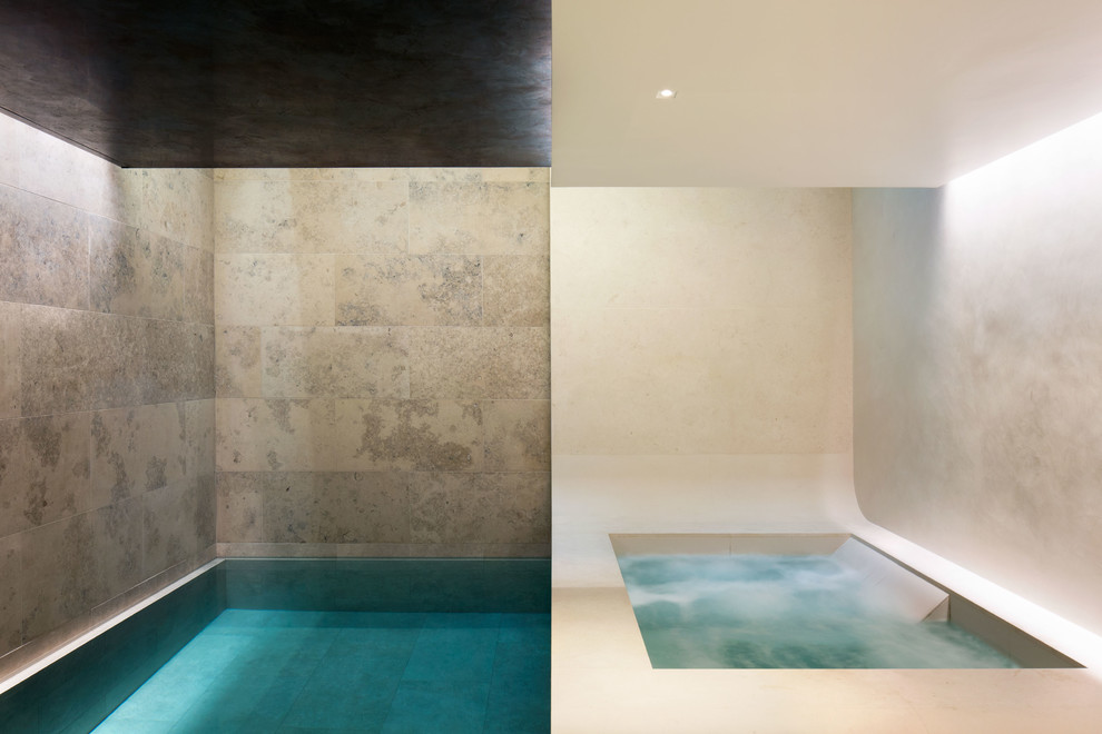 Inspiration for a large contemporary indoor rectangular lengths hot tub in London.