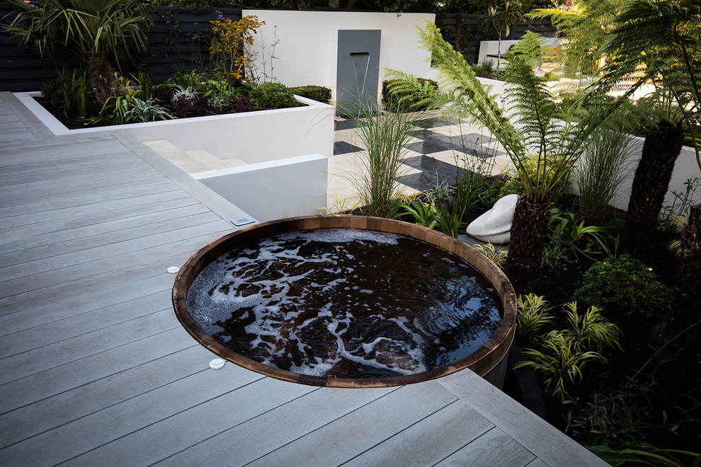 Small contemporary back hot tub in London.
