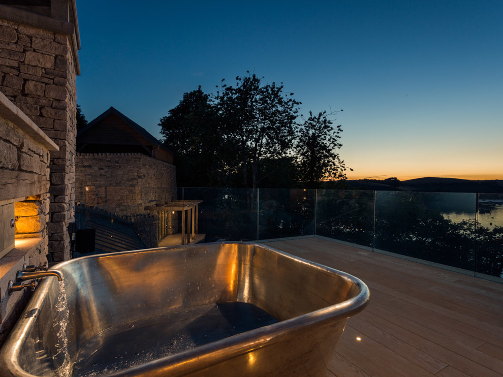 Inspiration for a medium sized contemporary roof rectangular above ground hot tub in Devon.