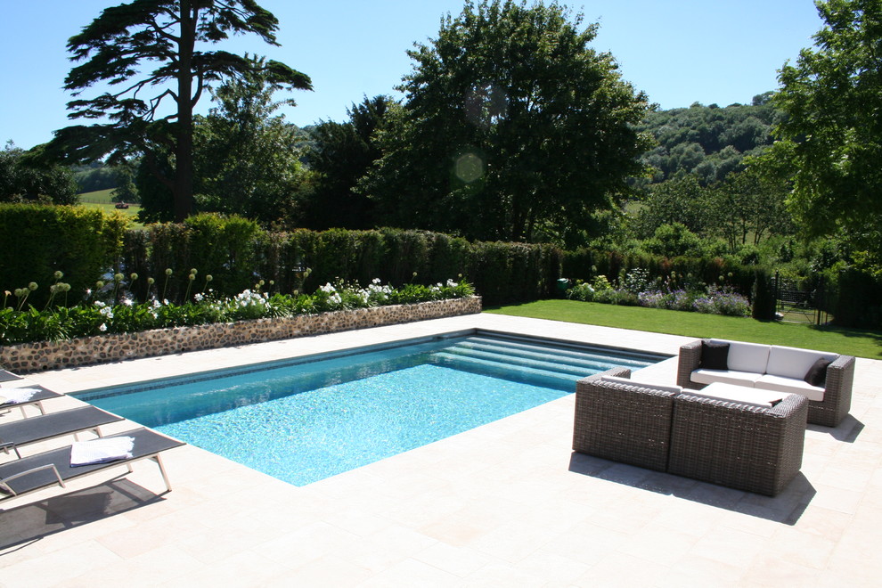 Contemporary swimming pool in Surrey.