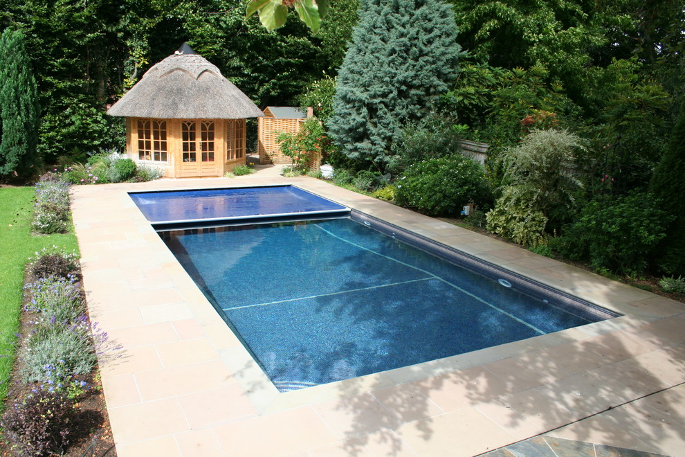 Design ideas for a farmhouse swimming pool in Surrey.
