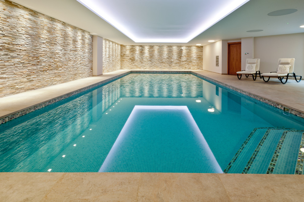 Photo of a contemporary indoor rectangular swimming pool in Kent.